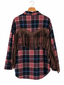 Camicia quadri e frange