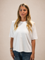 T-shirt spallacci